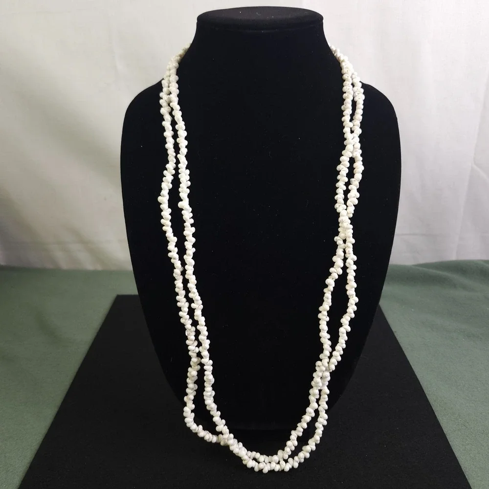 Vintage 2 strand pearl necklace possibly made with angel skin coral beads